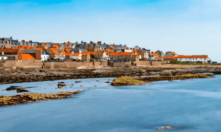 View of harbour with blue sea at the rfron of the photo. Anstruther Fife Coastal Path