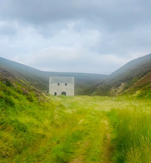 Lecht Mine in a green valley on the Snow Roads