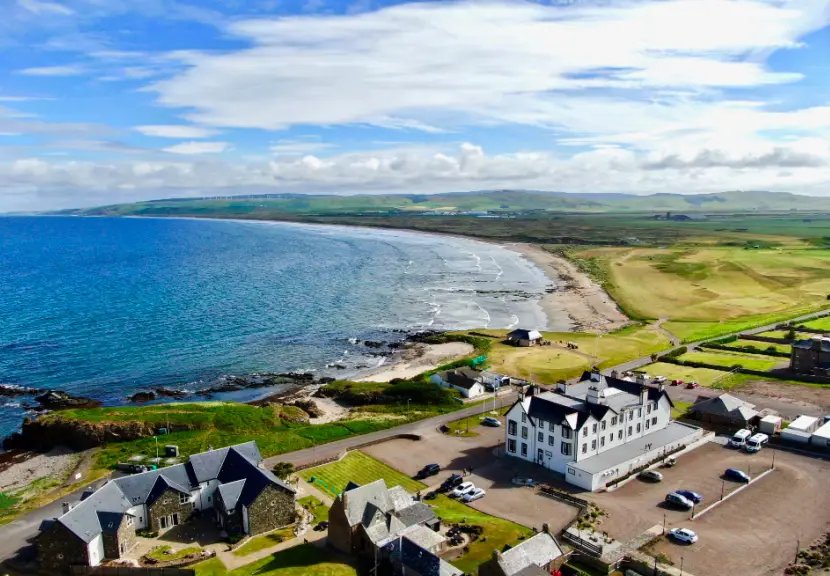 Machrihanish Beach aerial bird ye view of beach, sea and hotel.