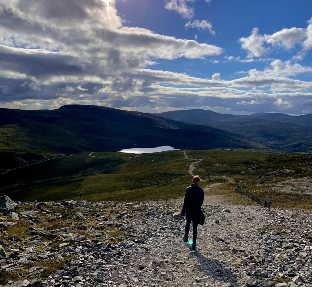 Person walking down a mountain - Carn Aosda part of the Cairnwell 3.