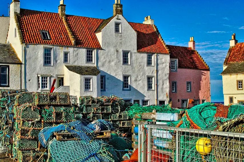 White fishermen houses with fishermen equipment Pittenweem